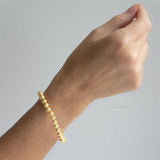 Lenny & Eva 6mm Gold Sparkle Bead Bracelet